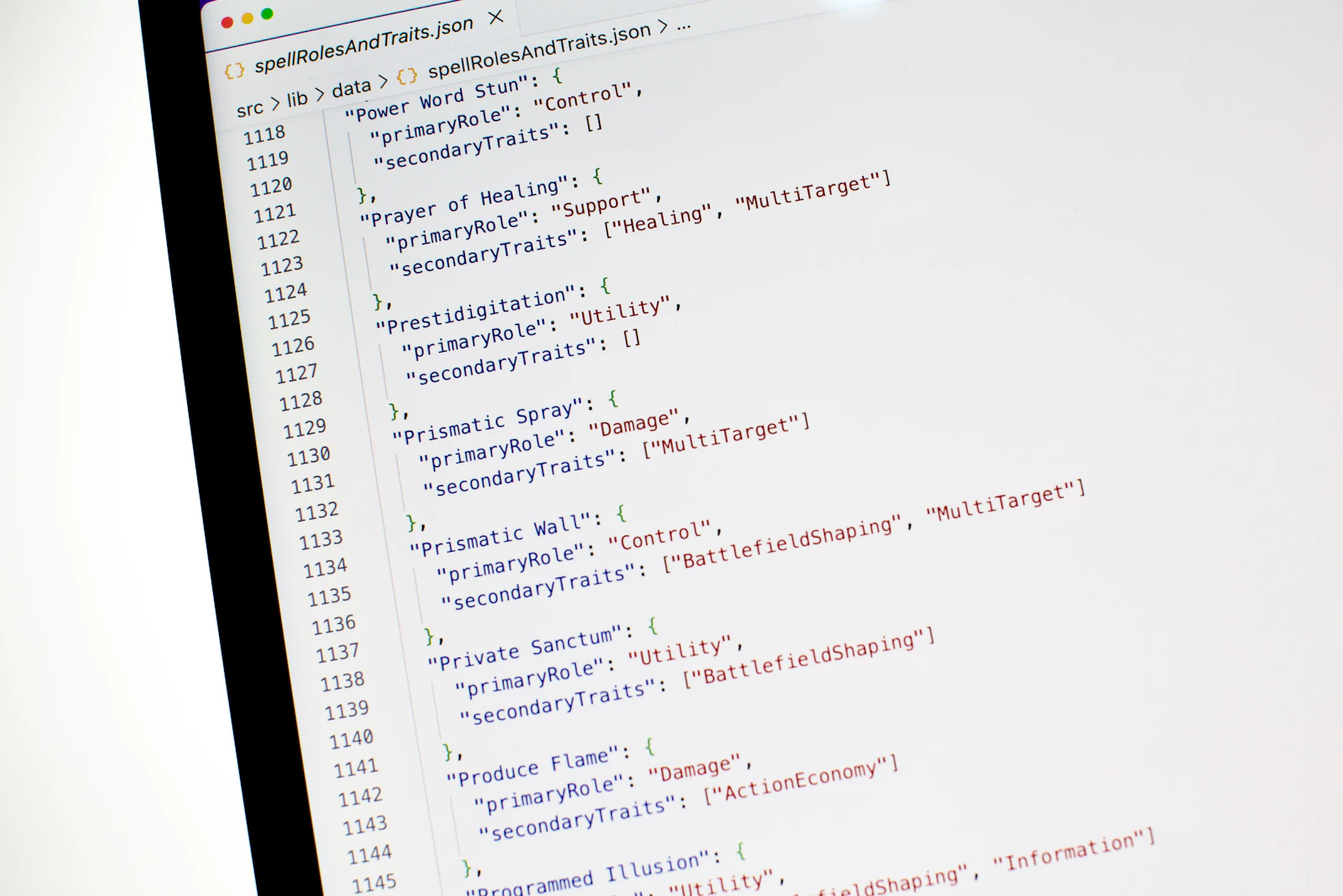 A photo of a computer with all kinds of JSON spell data