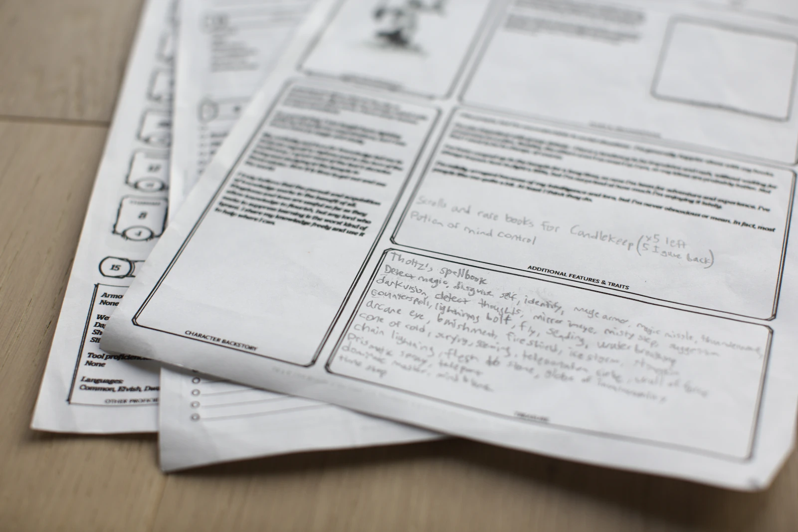 A character sheet with roughly written spells captured